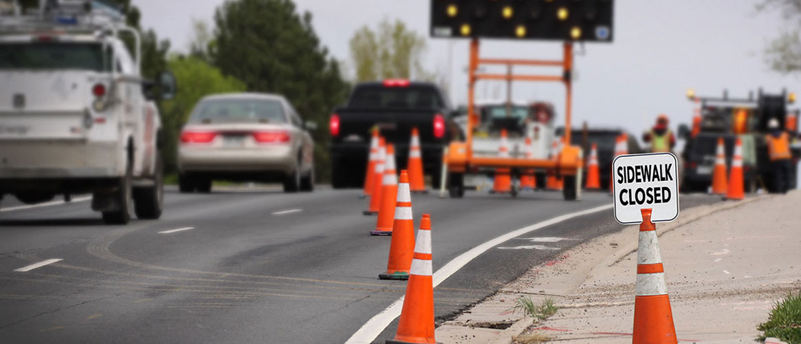 roadwork on road with signs